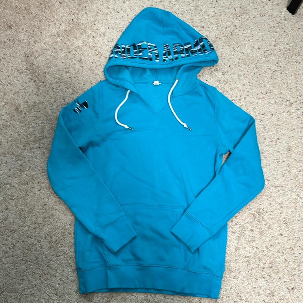 Bright blue, almost teal Under Armour hoodie. Tag missing, size medium